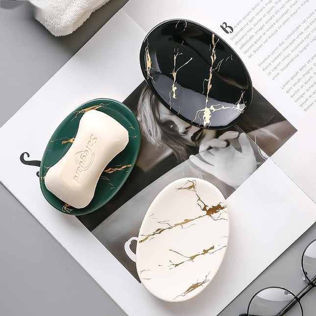 Oval såpeholder med svart marmoreffekt