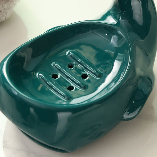 Keramisk såpeholder formet som en hval