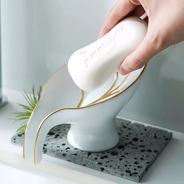 Bladformet såpeholder i grønn keramikk