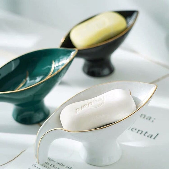 Bladformet såpeholder i grønn keramikk