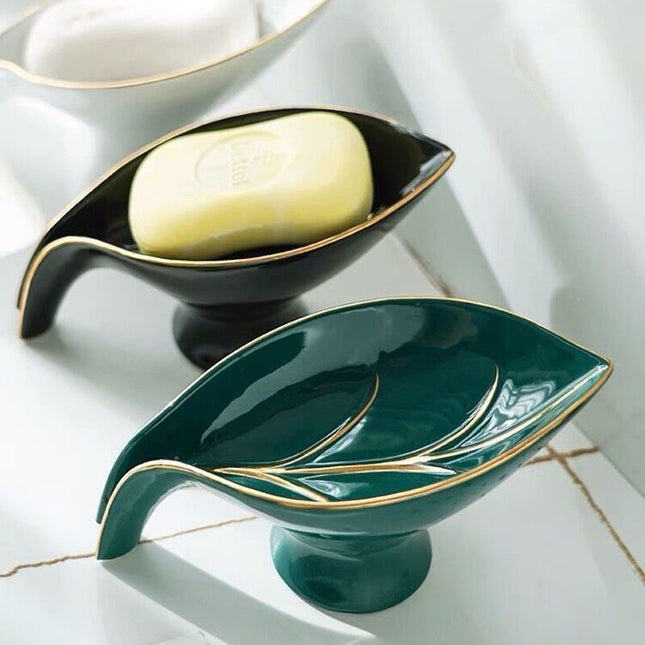 Bladformet såpeholder i grønn keramikk