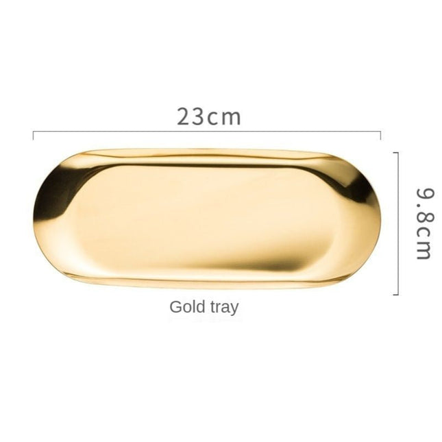 Rund gullfarget såpedispenser med mønster