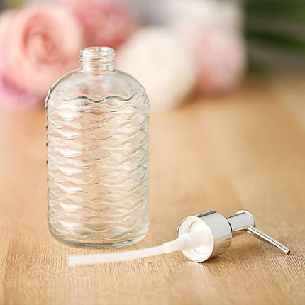 Glassdispenser for såpe med bølgemønster