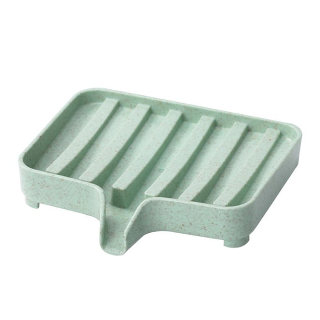 Selvdrenerende såpekopp i plast for vask