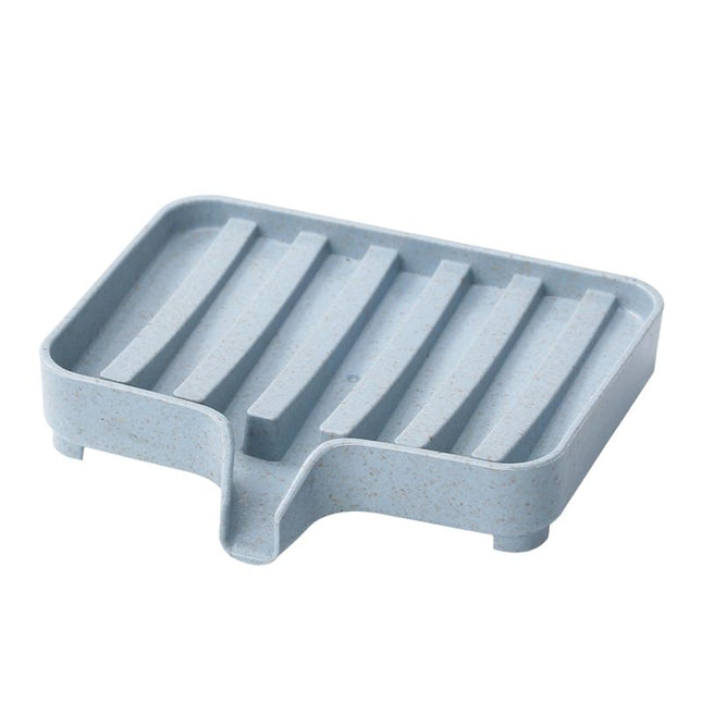 Selvdrenerende såpekopp i plast for vask