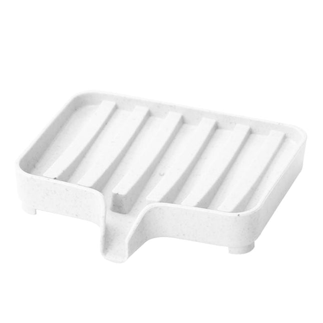 Selvdrenerende såpekopp i plast for vask