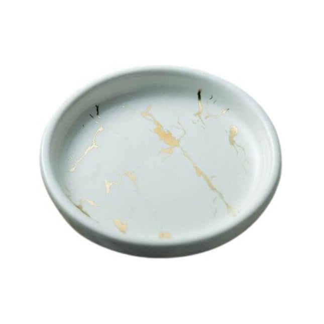 Rundt såpefat med svart marmorlook