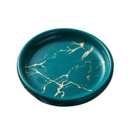 Rundt såpefat med svart marmorlook