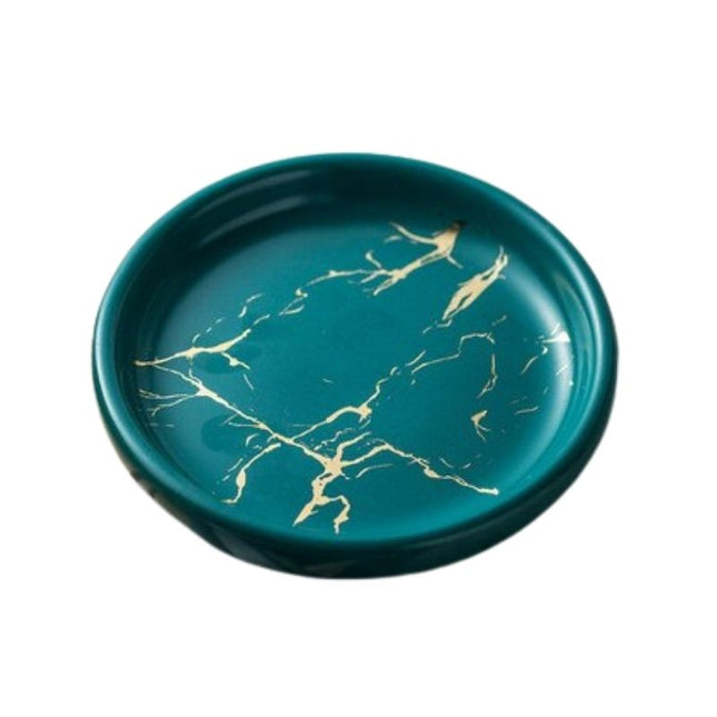 Rundt såpefat med svart marmorlook