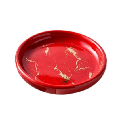 Rundt såpefat med svart marmorlook