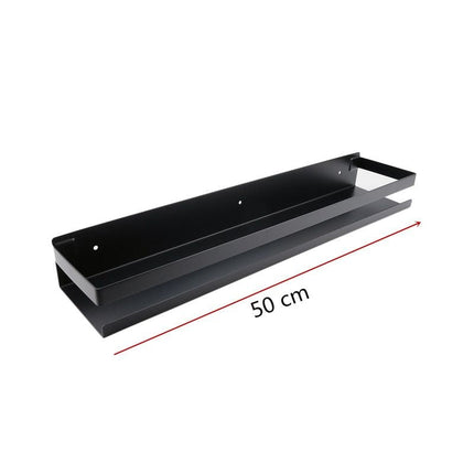 Svart designhylle for sjampo i dusjen